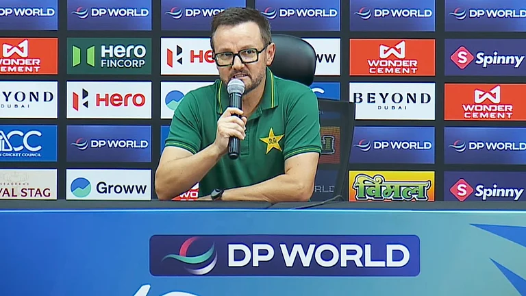 PAK coach Mike Hesson during a press-conference. - X