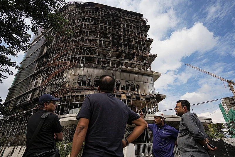 Aftermath of Nepals protests: Charred Hilton Hotel