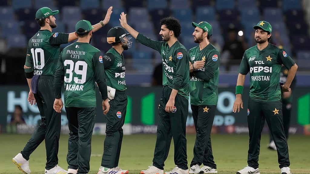 AP : Pakistan's Sufiyan Muqeem, centre, celebrates with teammates after the dismissal of Oman's Hammad Mirza during the Asia Cup.