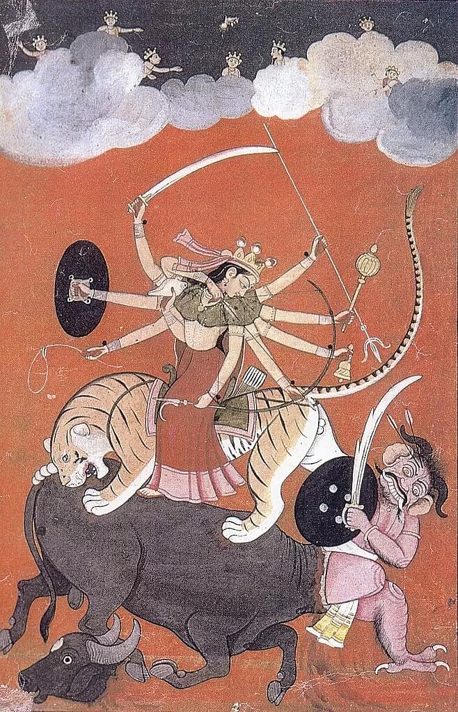 A multi-armed Hindu goddess Durga, riding a tiger, battling a demon