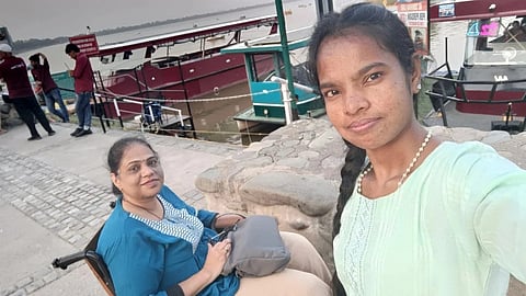 Madhuri with one of her caregivers, who has now become a part of the family. 