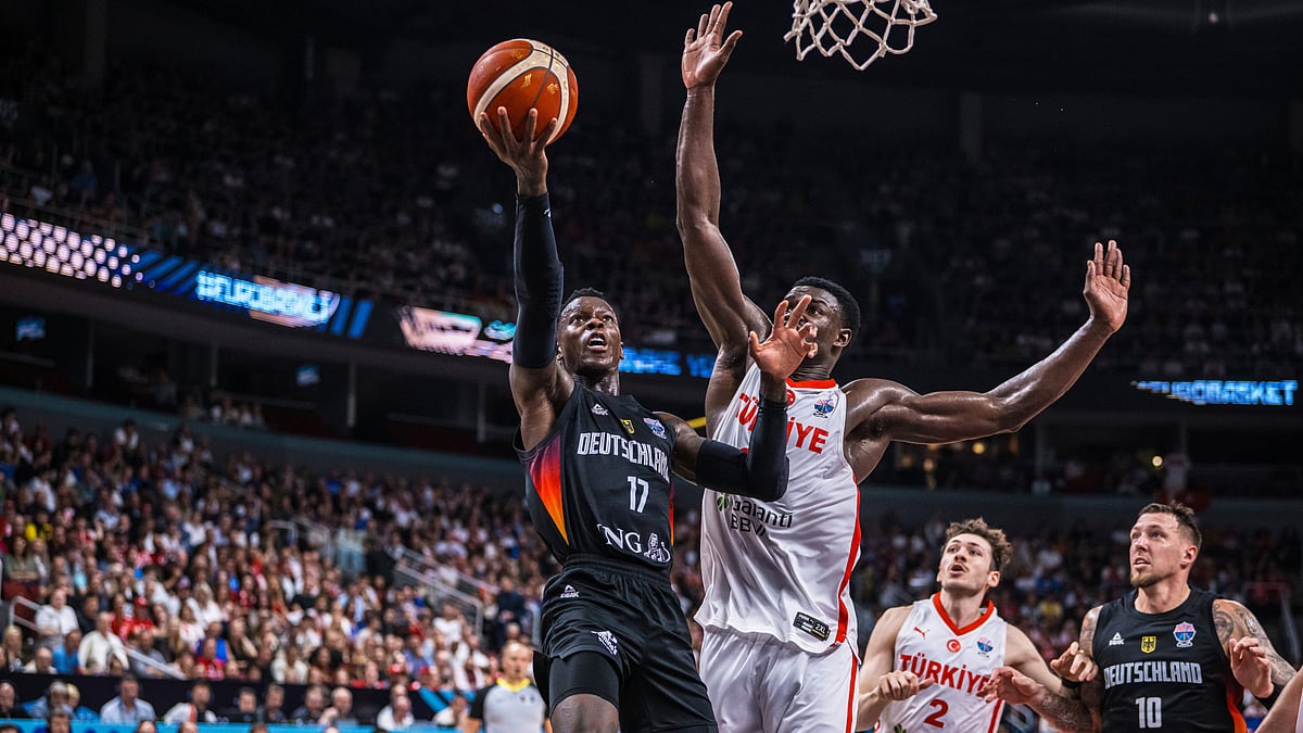 Dennis Schroder gets to the basket for Germany during Sunday's final