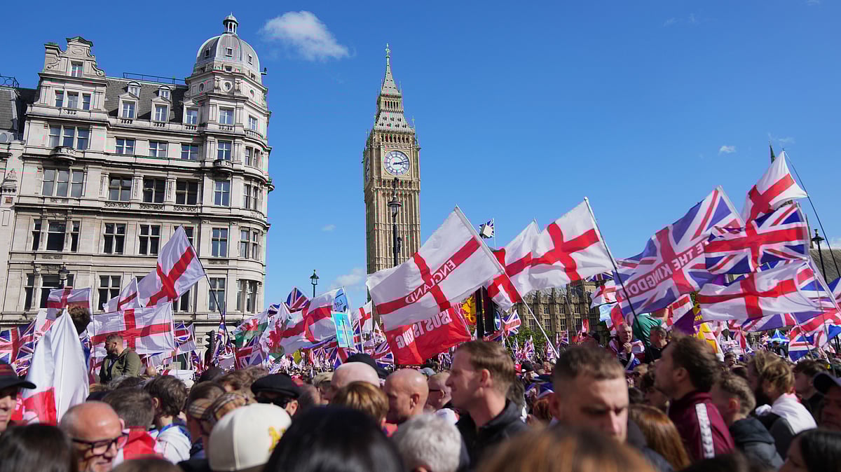 AP Photo/Joanna Chan | : People demonstrate during the Tommy Robinson-led Unite the Kingdom march and rally, in London, Saturday Sept. 13, 2025. | 