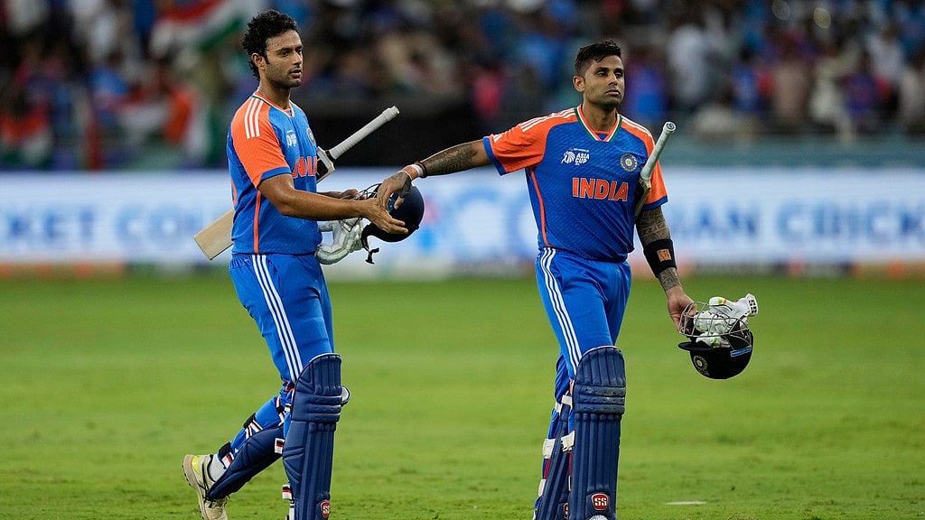 AP/Altaf Qadri : India's captain Suryakumar Yadav, right celebrates with batting partner Shivam Dube after their win in the Asia Cup cricket match against Pakistan at Dubai International Cricket Stadium in Dubai.
