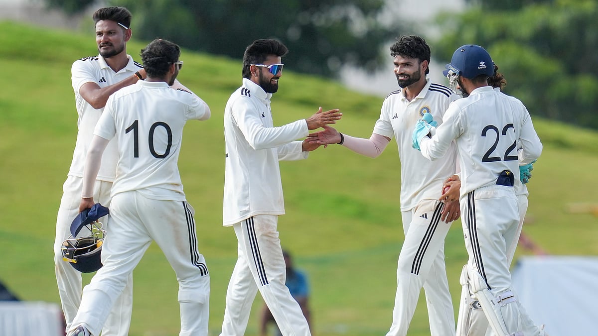 PTI/Shailendra Bhojak : Central Zone's Kumar Kartikeya celebrates with teammates after taking the wicket of South Zone's Ankit Sharma on day four of the Duleep trophy 2025 final cricket match between South Zone and Central Zone, at BCCI Centre of Excellence ground, in Bengaluru.