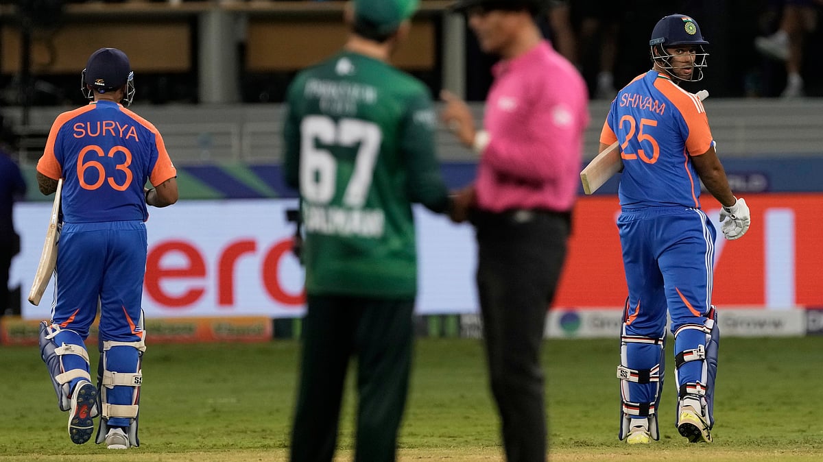 | Photo: AP/Fatima Shbair : India's captain Suryakumar Yadav, left, and batting partner Shivam Dube, right, leave the field after their win in the Asia Cup cricket match against Pakistan at Dubai International Cricket Stadium in Dubai, United Arab Emirates, Sunday, Sept. 14, 2025.