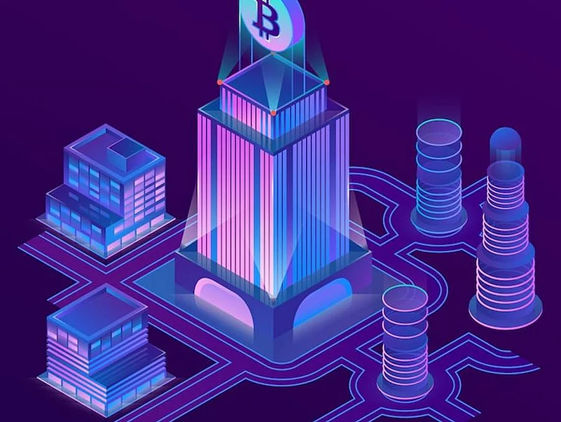 Futuristic digital illustration of interconnected building and circuits in blue tones.