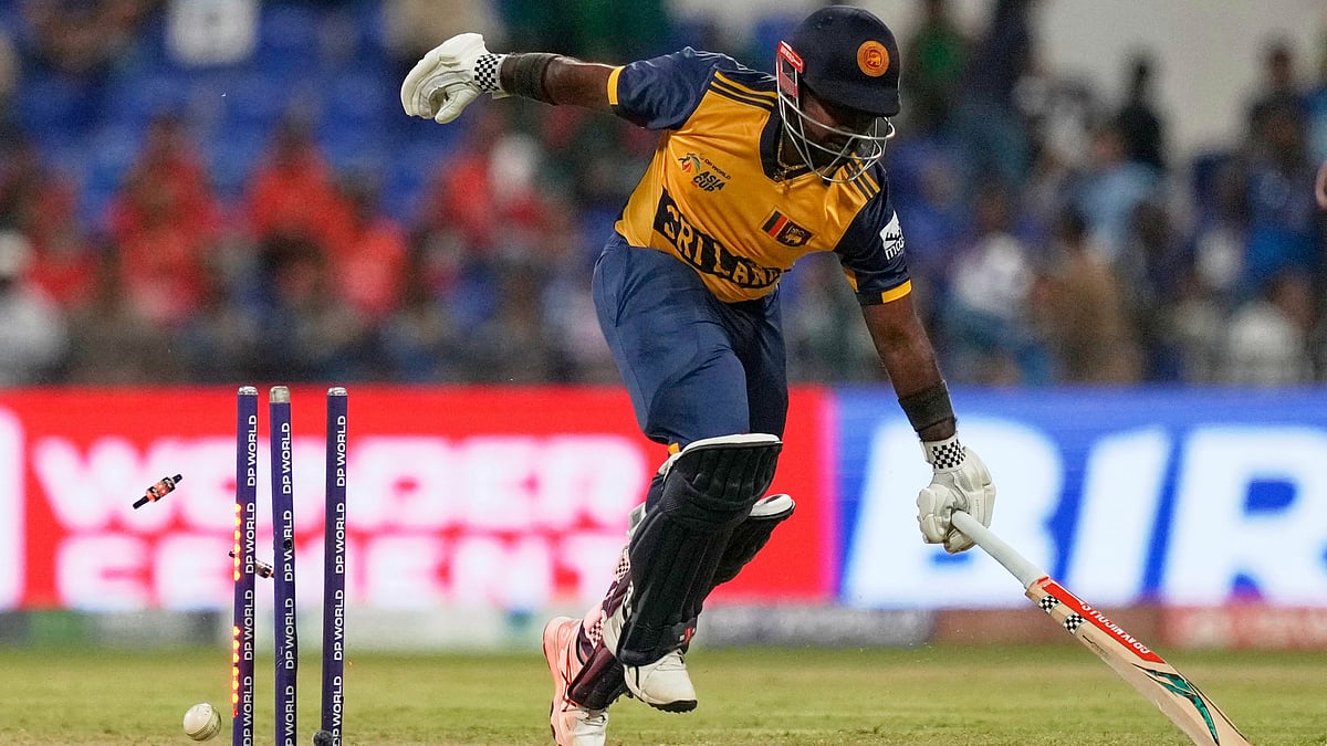 | Photo: AP/Altaf Qadri : Sri Lanka's captain Charith Asalanka reaches his creases as he runs between the wickets during the Asia Cup cricket match between Bangladesh and Sri Lanka at Zayed Cricket Stadium in Abu Dhabi, United Arab Emirates, Saturday, Sept. 13, 2025.