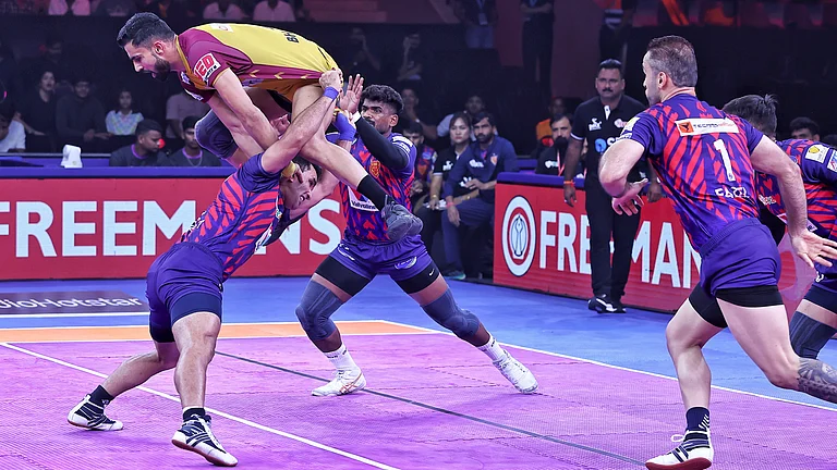 Action from the Pro Kabaddi League match between Telugu Titans and Dabang Delhi in Jaipur. - Pro Kabaddi