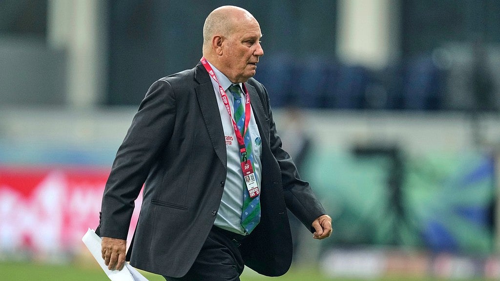 AP : Match referee Andy Pycroft walks back after the toss during the Asia Cup cricket match between Pakistan and United Arab Emirates at Dubai International Cricket Stadium.