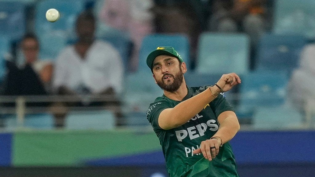 AP : Pakistan's captain Salman Agha fields a ball during the Asia Cup match against UAE in Dubai.