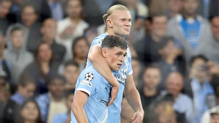 Erling Haaland and Phil Foden during their Champions League win over Napoli. - null