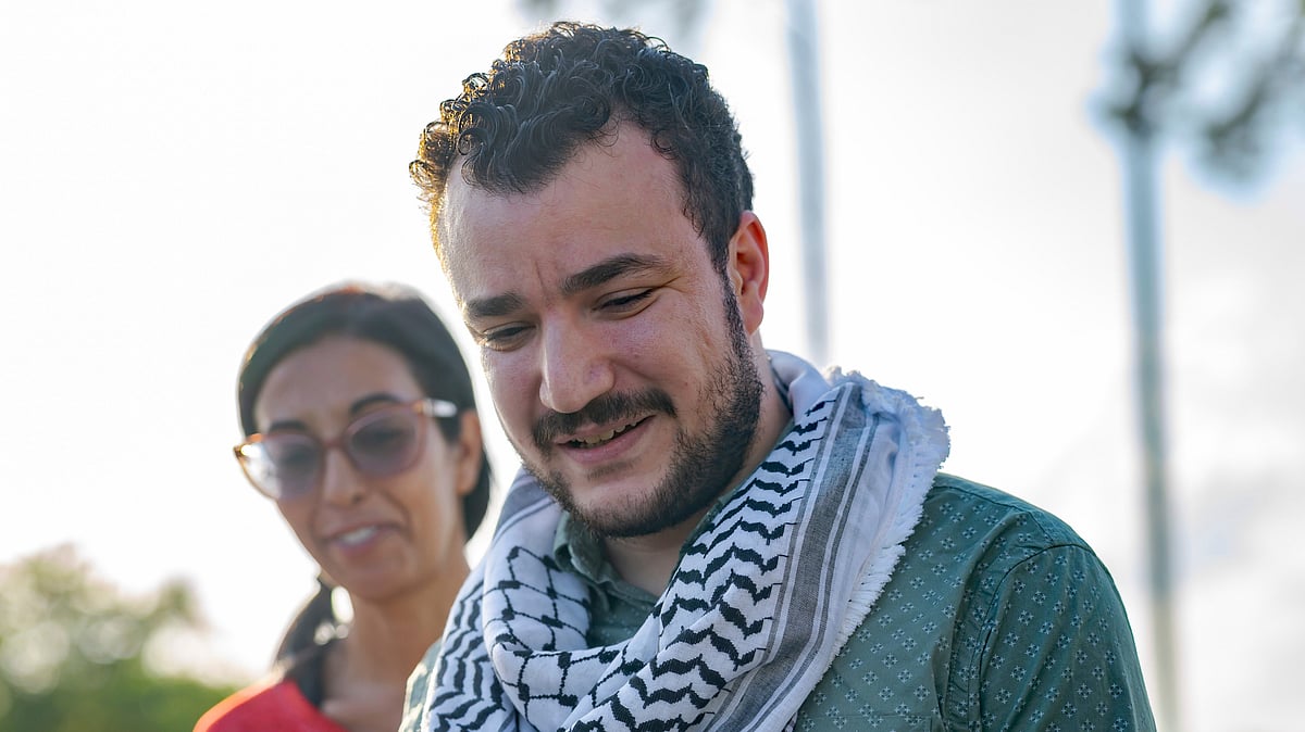 Matthew Hinton/AP Photo | : Mahmoud Khalil |