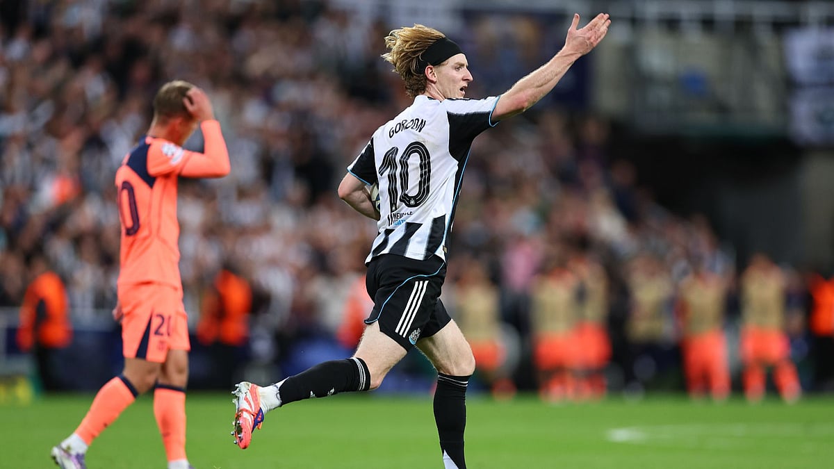 Anthony Gordon celebrating his goal for Newcastle United against FC Barcelona.