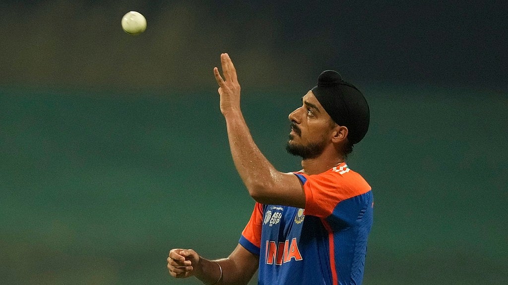 Arshdeep Singh in action during the Asia Cup cricket match between India and Oman at Zayed Cricket Stadium in Abu Dhabi. - AP