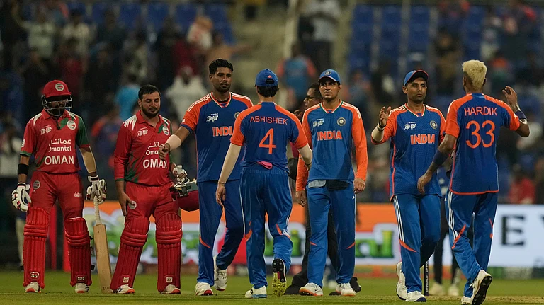 India's players celebrate their team's victory during the Asia Cup cricket match against Oman at Zayed Cricket Stadium in Abu Dhabi, United Arab Emirates, Friday, Sept. 19, 2025. - (AP Photo/Altaf Qadri)