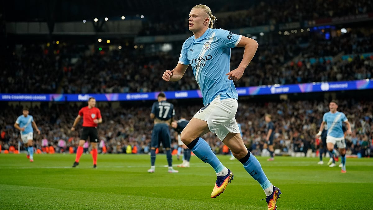 | Photo: AP/Dave Thompson : Manchester City's Erling Haaland celebrates after scoring the opening goal during the Champions League opening phase soccer match between Manchester City and Napoli at the Etihad Stadium in Manchester, England, Thursday, Sept. 18, 2025.