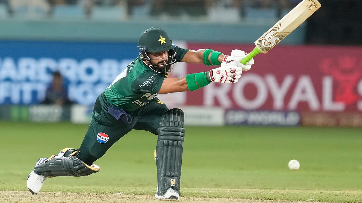 | Photo: AP/Altaf Qadri : Pakistan's Sahibzada Farhan plays a shot during the Asia Cup cricket match between India and Pakistan at Dubai International Cricket Stadium in Dubai, United Arab Emirates, Sunday, Sept. 21, 2025.