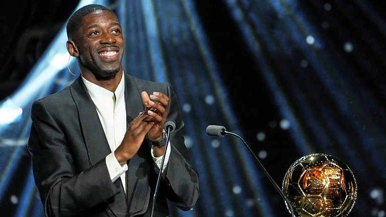 Paris Saint-Germain's Ousmane Dembele receives the 2025 Men's Ballon d'Or during the awards ceremony at the Theatre du Chatelet in Paris. - Photo: AP