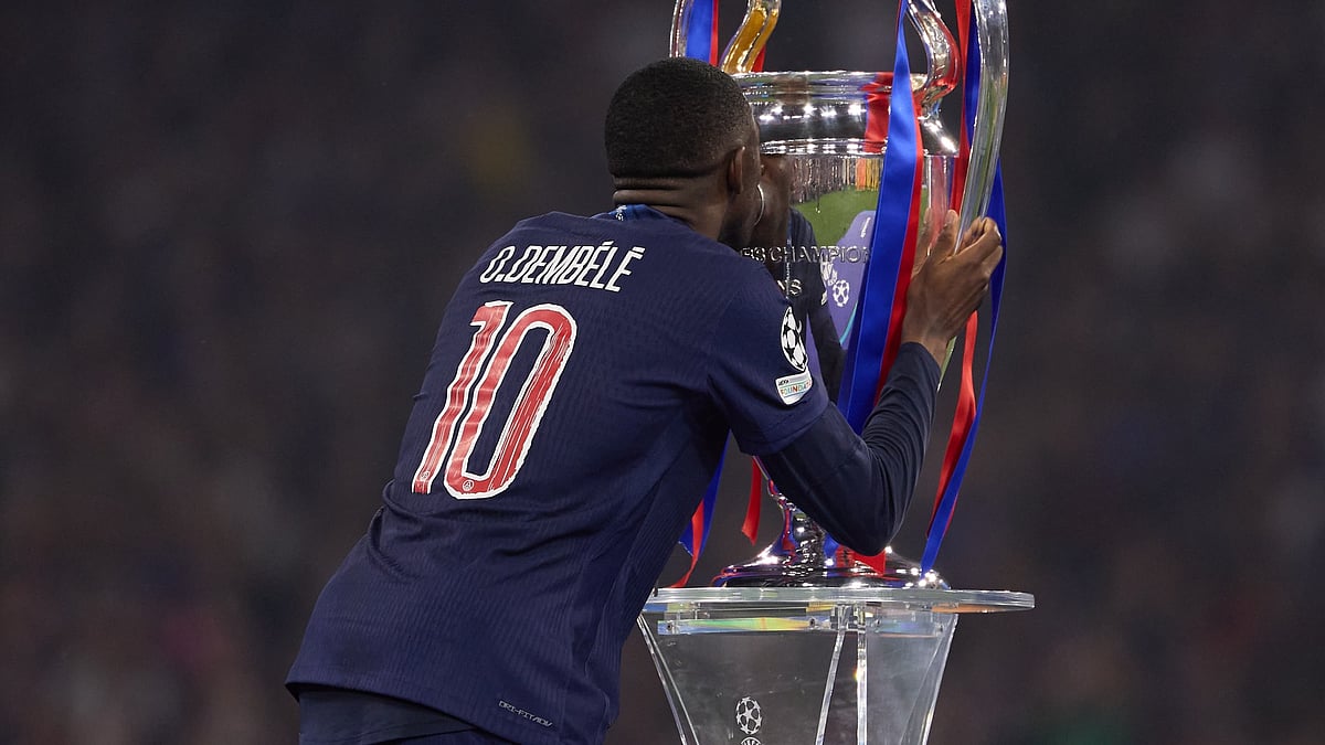 Ousmane Dembele with the Champions League trophy