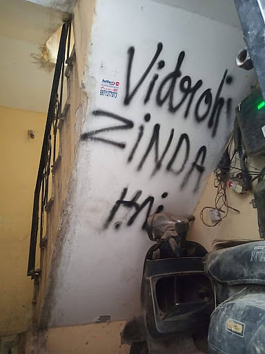 A graffiti, back of stairs at Ashutosh’s rented flat in vijay nagar