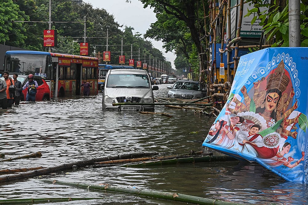 | Photo: PTI : Weather: Rain in Kolkata