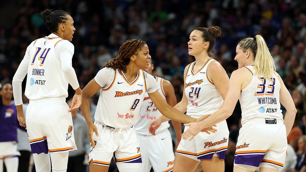 Members of the Phoenix Mercury celebrate against the Minnesota Lynx in the third quarter during Game Two of the WNBA Semifinals at Target Center on September 23, 2025 in Minneapolis, Minnesota. The Mercury defeated the Lynx 89-83 in overtime.