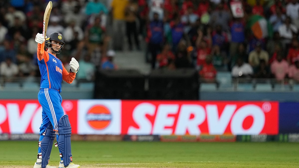 | Photo: AP/Altaf Qadri : India's Abhishek Sharma celebrates his fifty runs during the Asia Cup cricket match between India and Bangladesh at Dubai International Cricket Stadium in Dubai, United Arab Emirates, Wednesday, Sept. 24, 2025.