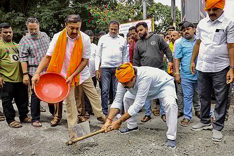 BJP protest against roads deterioration