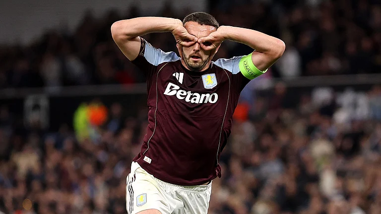 John McGinn celebrates his early goal for Aston Villa as they defeat Bologna 1-0. - null