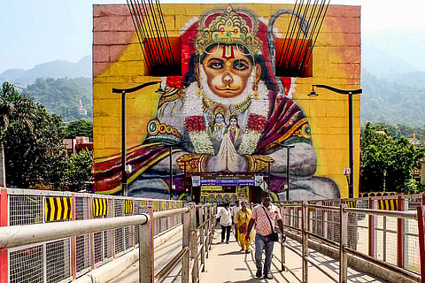 People cross Janaki Setu bridge in Rishikesh