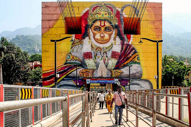 People cross Janaki Setu bridge in Rishikesh