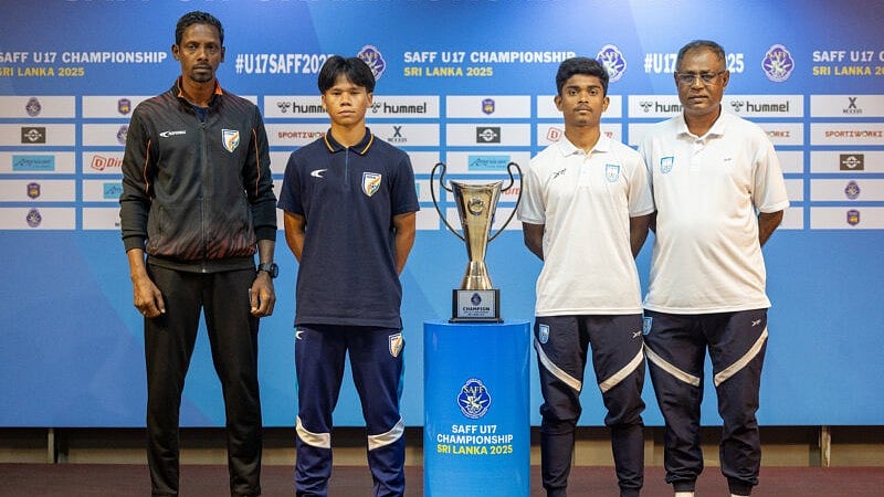 AIFF : India captain Wangkhem Denny Singh and coach Bibiano Fernandes (left) pose with the SAFF U17 trophy alongside their Bangladesh counterparts ahead of the final.