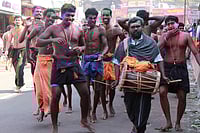 Shutterstock : Devotees of Lord Ayyappa sing and dance at a procession on their way to Sabarimala on December16, 2011 in Erumeli, India. Around 50 million visit Sabarimala every year.