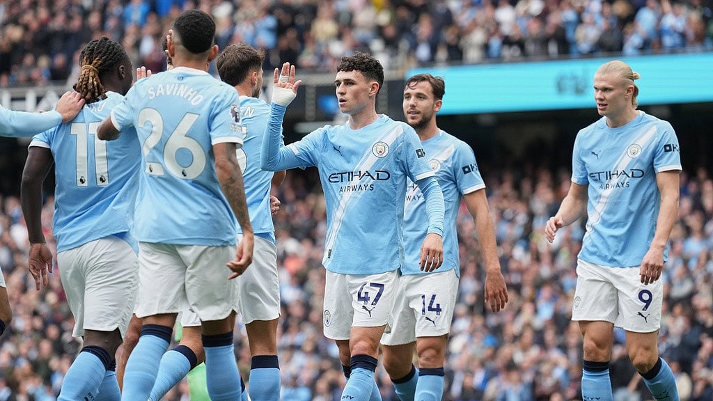 Photo: AP : Manchester City Vs Burnley Highlights, English Premier League: Phil Foden celebrates Cityzens' opening goal with teammates.
