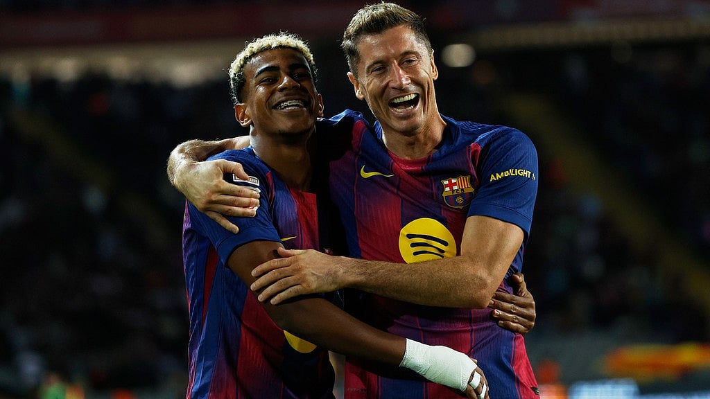 Photo: AP : Barcelona Vs Real Sociedad Highlights, La Liga: Lamine Yamal and Robert Lewandowski celebrate their side's second goal.