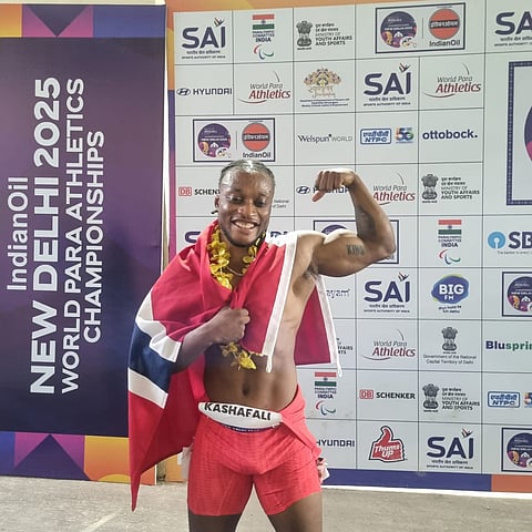 Salum Kashafali shows off his tattoo at the 2025 World Para Athletics Championships.