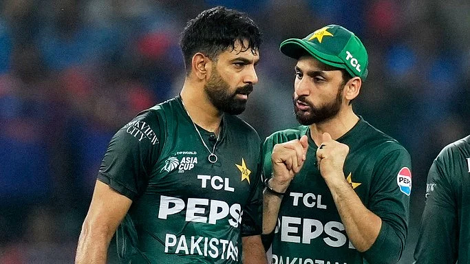 Pakistans Haris Rauf, left, celebrates with captain Salman Agha