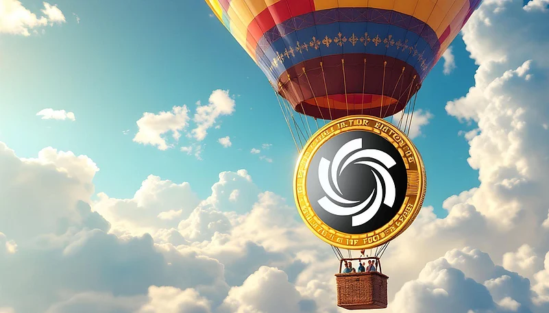 Hot air balloon flying in a cloudy blue sky, featuring a large golden coin with a swirling logo