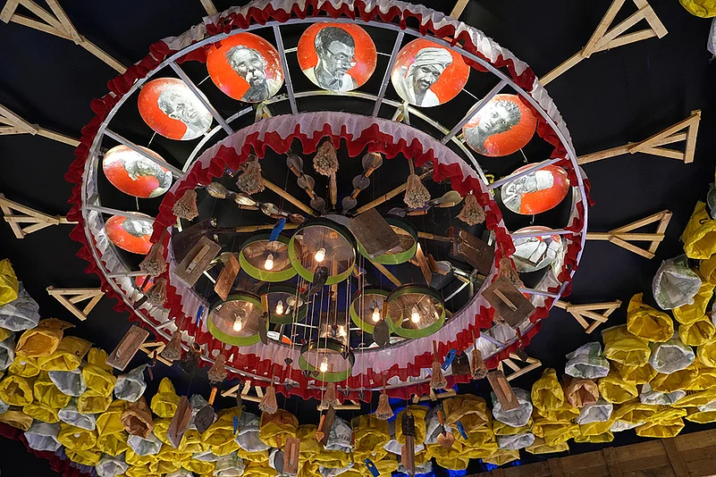 Durga puja 2025 Raipur club Ramgarh theme PORIJAYI Maigrant Labour