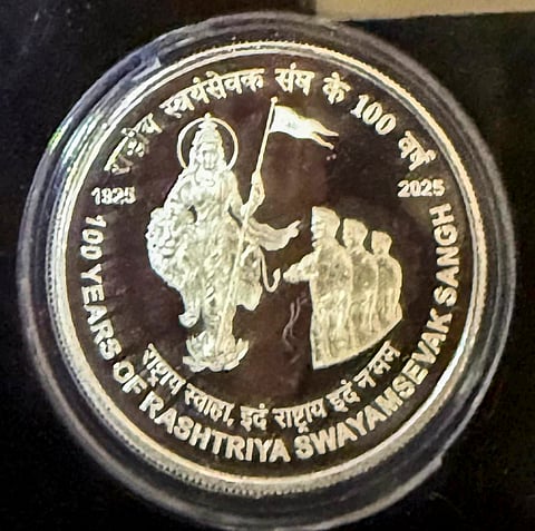 In this image received on Oct. 1, 2025, commemorative coin released to mark the centenary year of the Rashtriya Swayamsevak Sangh (RSS).