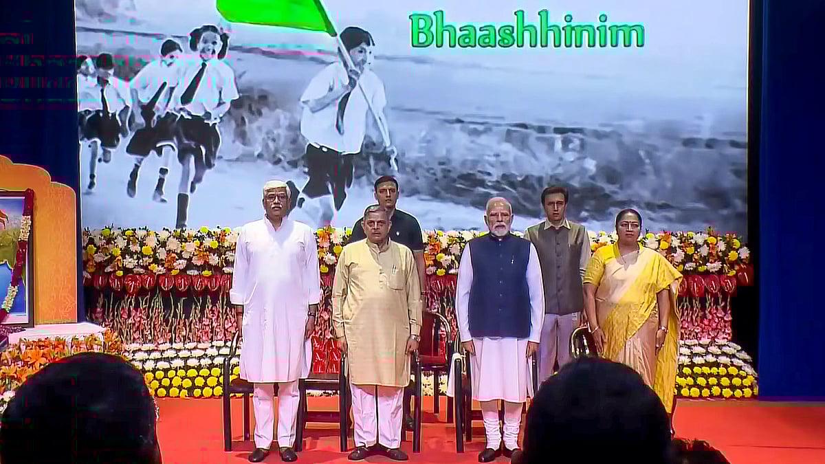 In this screengrab, PM Narendra Modi, RSS Sarkaryavah Dattatreya Hosabale, Delhi CM Rekha Gupta and others are seen at the RSS centenary celebrations at Dr Ambedkar International Centre, New Delhi. - (@NarendraModi/YT via PTI Photo)