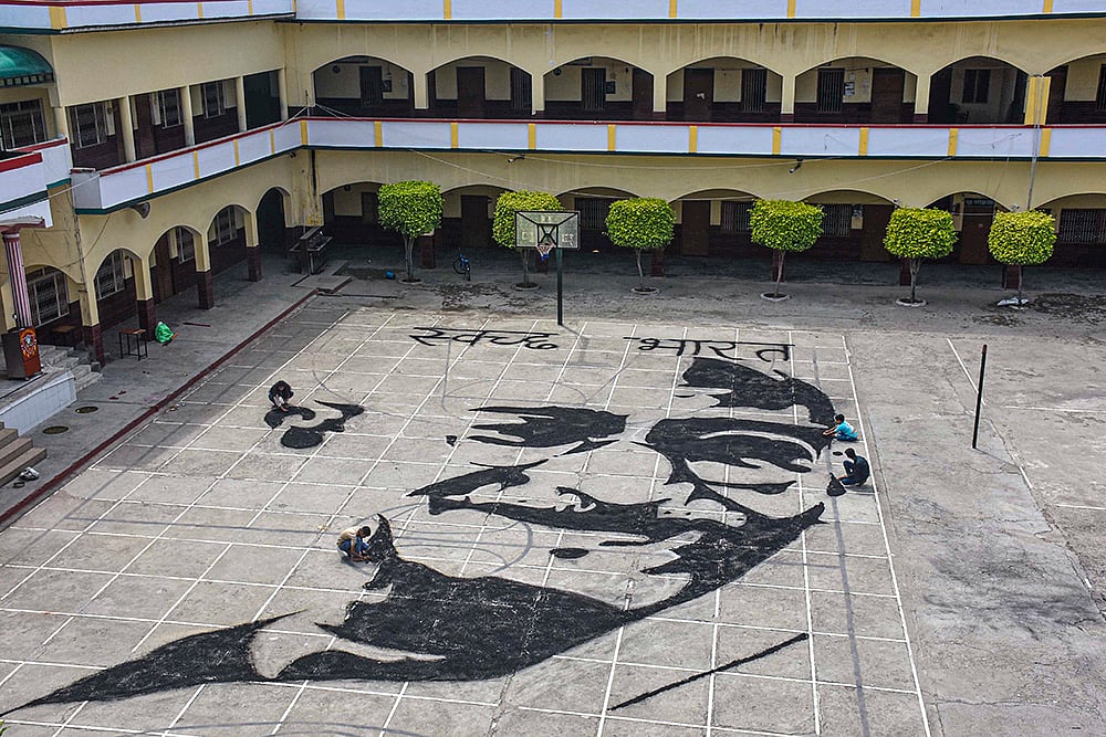 | Photo: PTI : Mahatma Gandhi's portrait