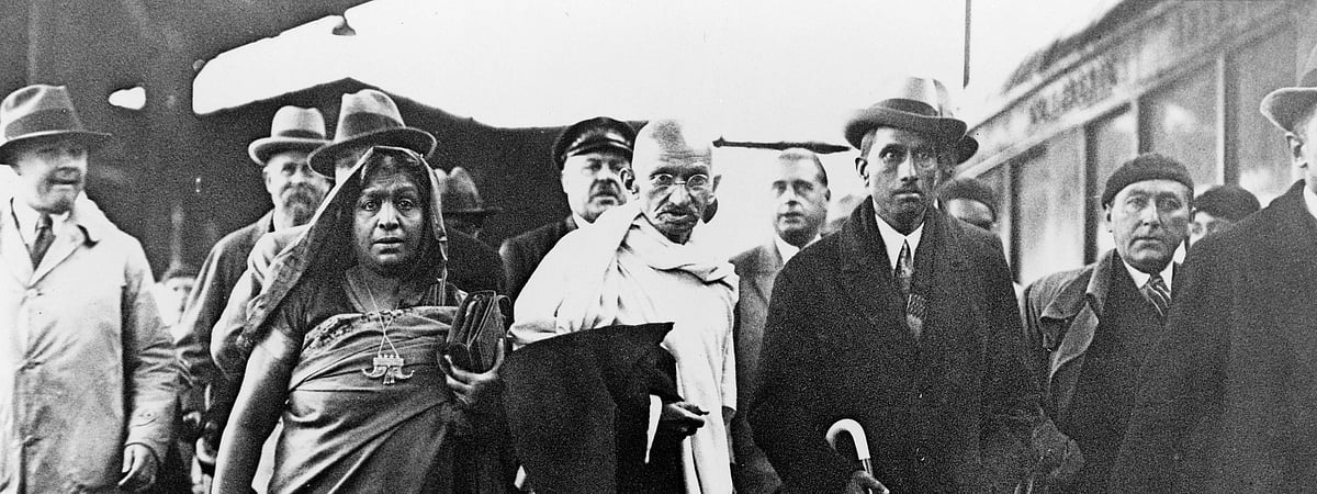 CreditIMAGO / GRANGER Historical Picture Archive
 : MOHANDAS GANDHI (1869-1948). With poet Sarojini Naidu en-route to the Second Round Table Conference in London, England. Photograph, 1931