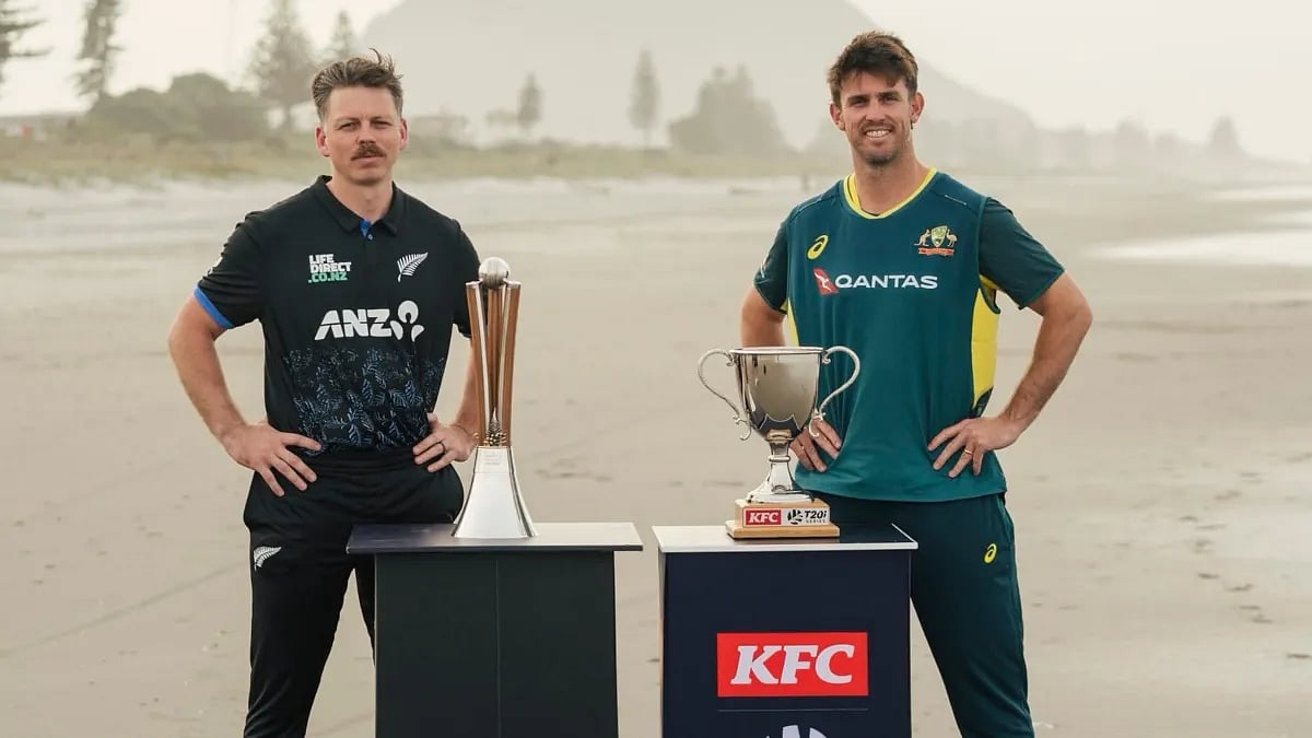New Zealand and Australia captains Michael Bracewell and Mitchell Marsh pose for the trophy. - X/BLACKCAPS