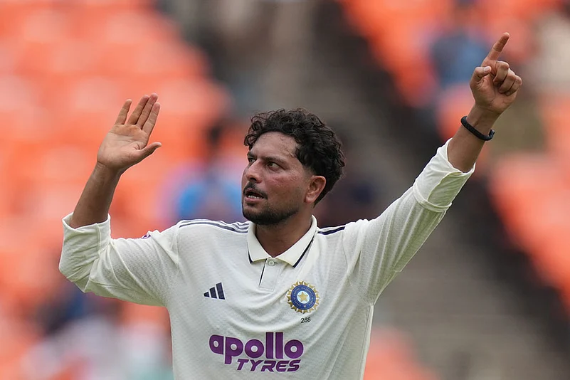 Indias Kuldeep Yadav celebrates the dismissal of West Indies Shai Hope