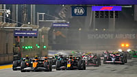 Singapore Grand Prix: F1 Race Declared 'Heat Hazard', Drivers Must Decide On Cooling Vests File/AP : McLaren driver Lando Norris of Britain leads the field into turn one at the start of the Singapore Formula One Grand Prix at the Marina Bay Street Circuit.