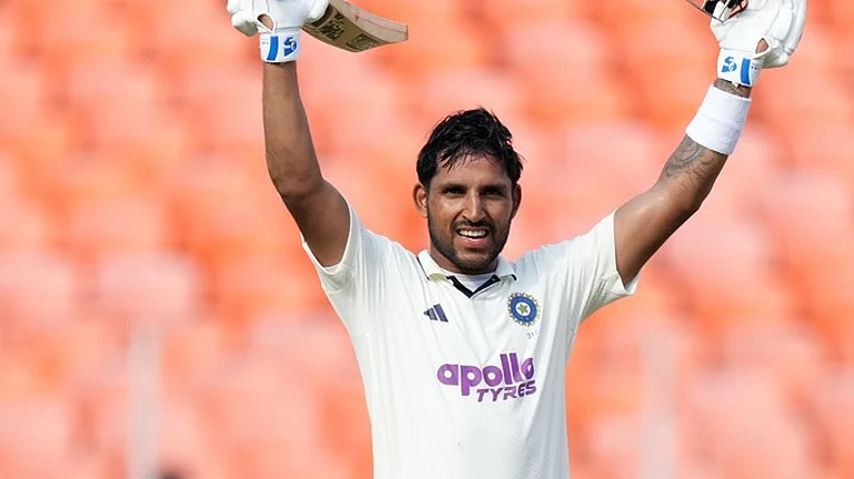 India's Dhruv Jurel celebrates after scoring a century on the second day of the first Test cricket match between India and West Indies at Narendra Modi Stadium. - AP/Ajit Solanki