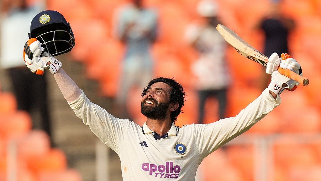 AP/Ajit Solanki : India's Ravindra Jadeja celebrates after scoring a century on the second day of the first Test against West Indies
