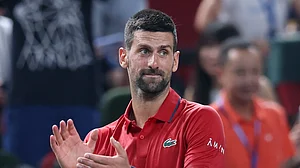Novak Djokovic reacts after winning against Marin Cilic in Shanghai Masters 2025.